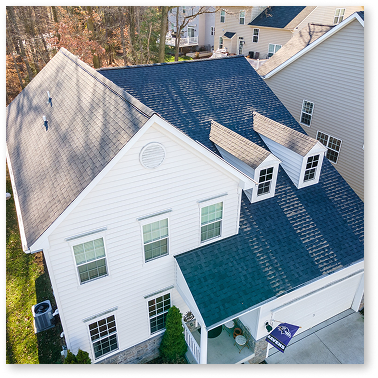 aerial shot of house with new Low Scope roof